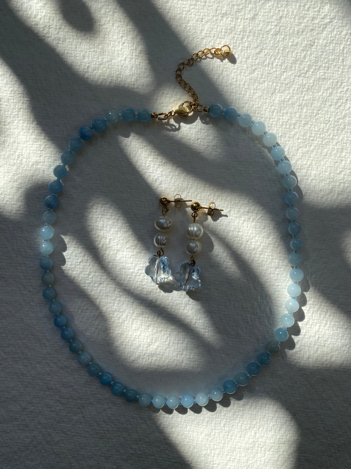 Les boucles d'oreilles Rosée